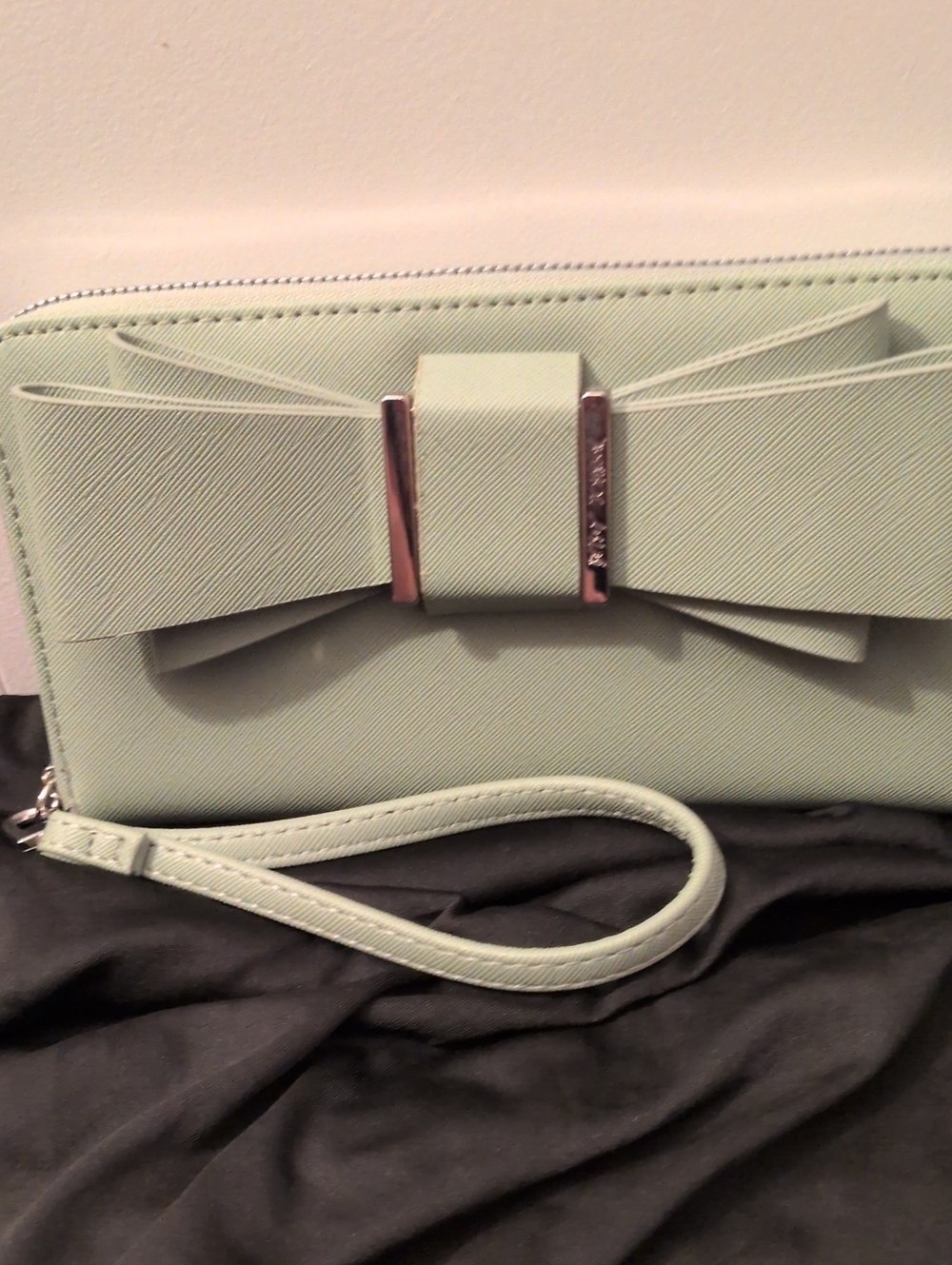 Betsey Johnson mint bow wristlet clutch
